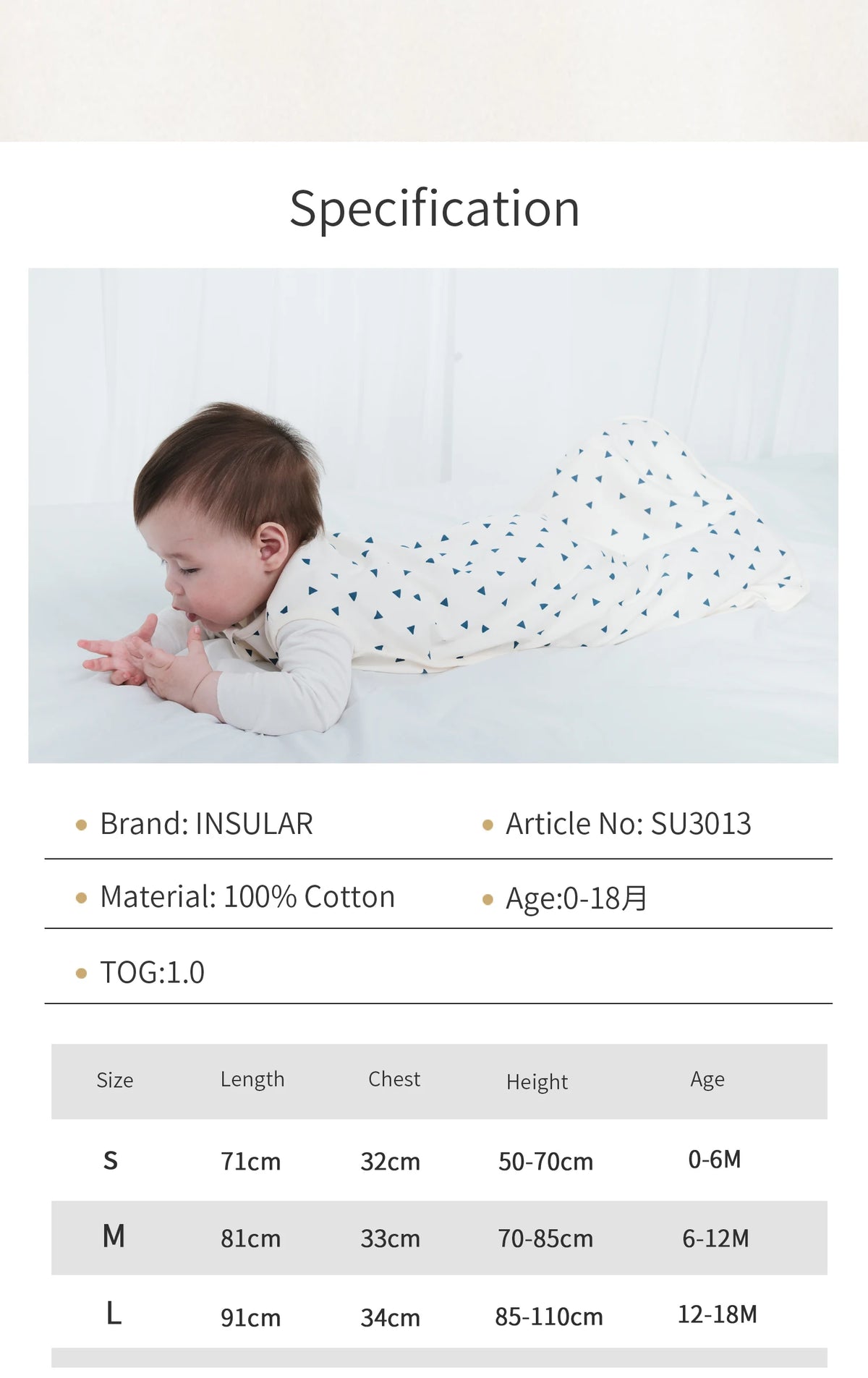 A baby is lying down wearing a white patterned cotton sleep sack for sleep.