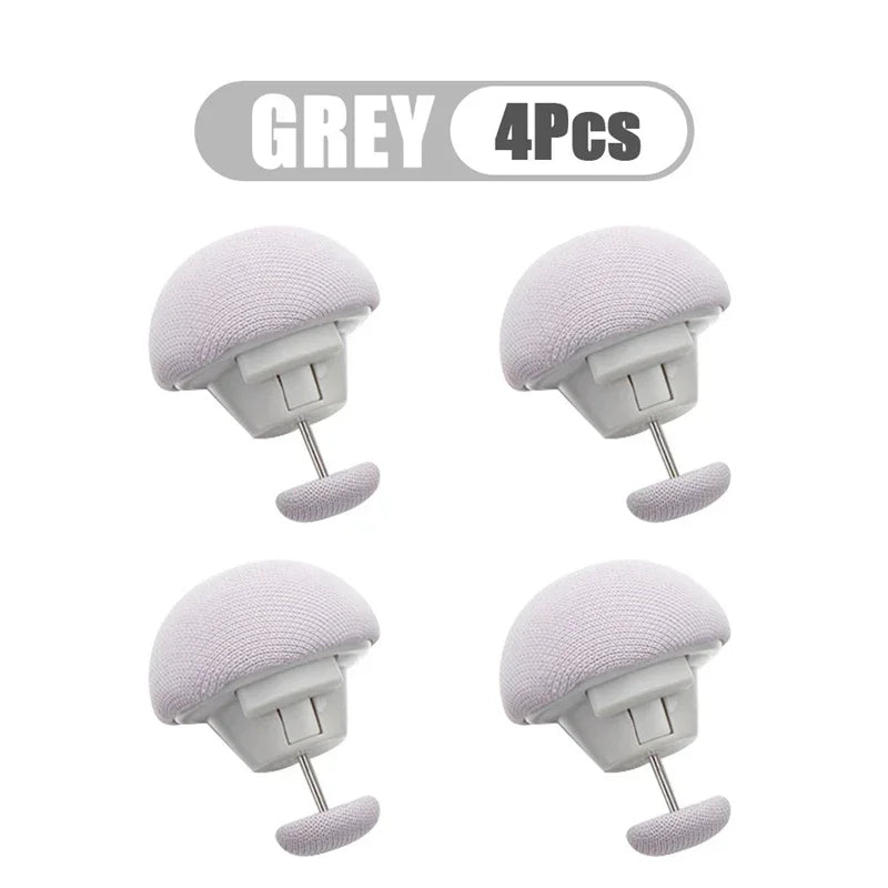 Four grey adjustable quilt and fabric clips are shown individually.