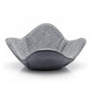 A gray quilted microwave bowl cozy designed as a heat resistant insulated holder.