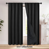 A pair of black blackout curtains hanging on a rod, shown next to a window.