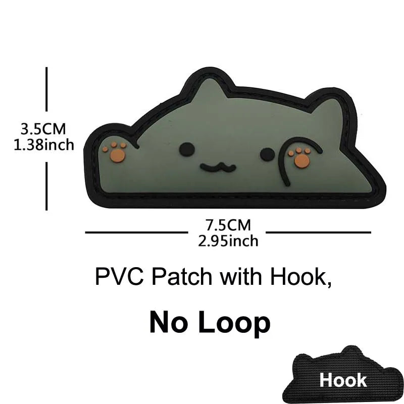 A gray cat-shaped PVC patch with a hook on the bottom edge.
