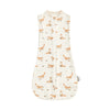 A cream-colored soft cotton baby sleeping bag featuring a repeating pattern of small orange and beige animal silhouettes.
