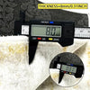 A digital thickness gauge measures 8.0 mm on a white towel, showing the measurement in millimeters and inches.