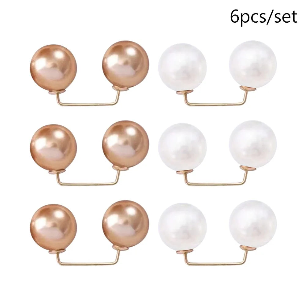 A set of six round pearl-like imitation jewelry pieces with gold-toned findings.