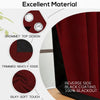 Close-up view of a maroon and black blackout curtain fabric showing details like grommet design, trimmed edges, and silky sof
