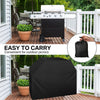 A black waterproof BBQ grill cover is shown next to a gas grill on a wooden deck.