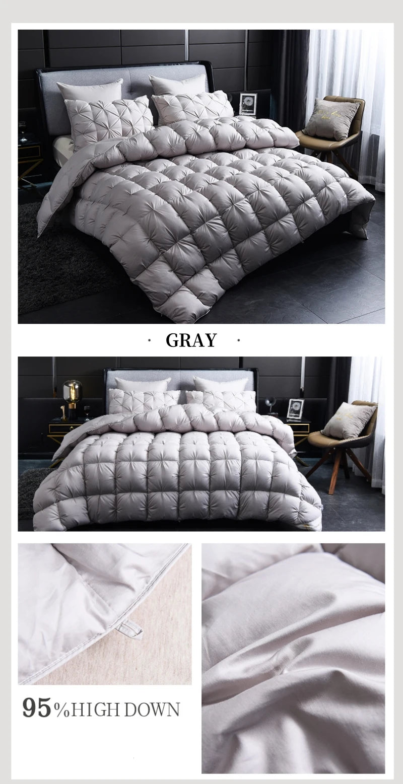 A gray luxury goose down duvet blanket displayed on a bed in a modern bedroom setting.