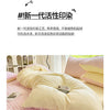 A light pink and white checkered duvet cover set with yellow accents is shown on a bed.