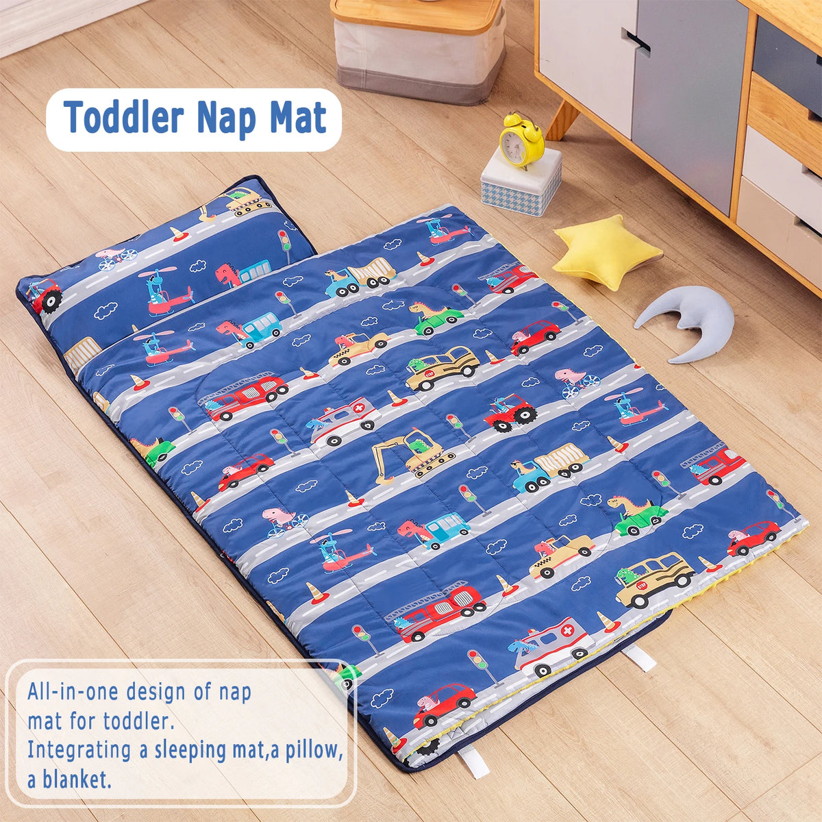 A blue toddler nap mat featuring a removable pillow and fleece blanket on a wooden floor.