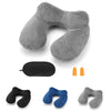 A collection of inflatable travel pillows in various shades of gray and blue, including a large gray pillow and smaller color