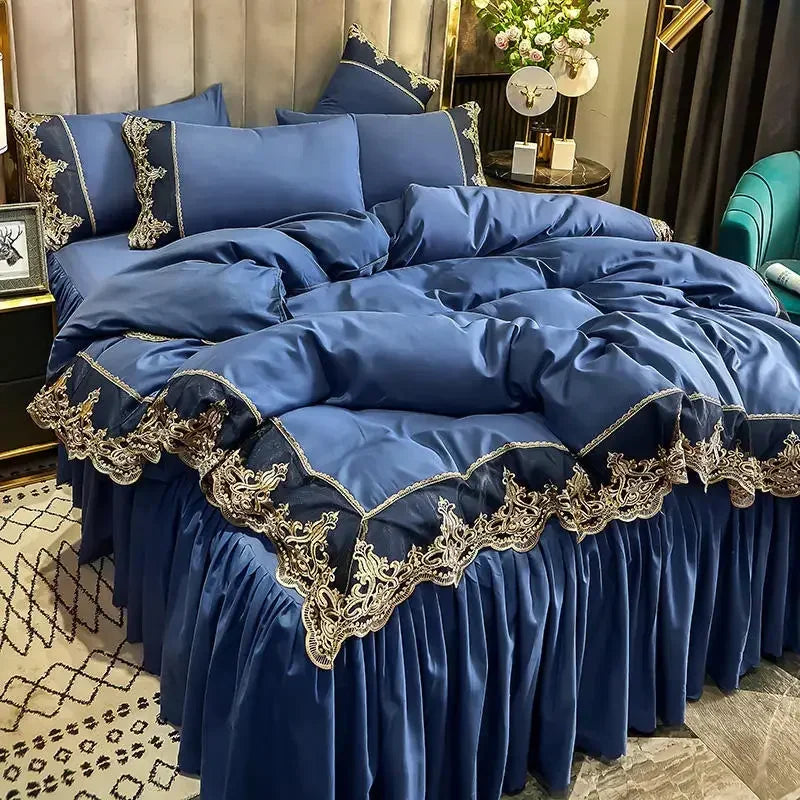 A luxurious royal blue bed skirt set featuring elegant lace edging and gathered fabric.