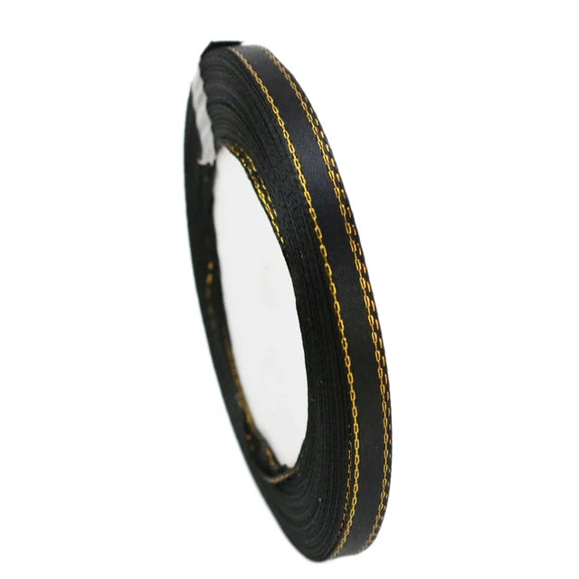 Roll of 6mm gold-edged satin ribbon in black for gift wrapping and crafts