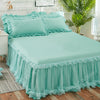 Light aqua princess lace bed skirt set with a matching duvet and pillows