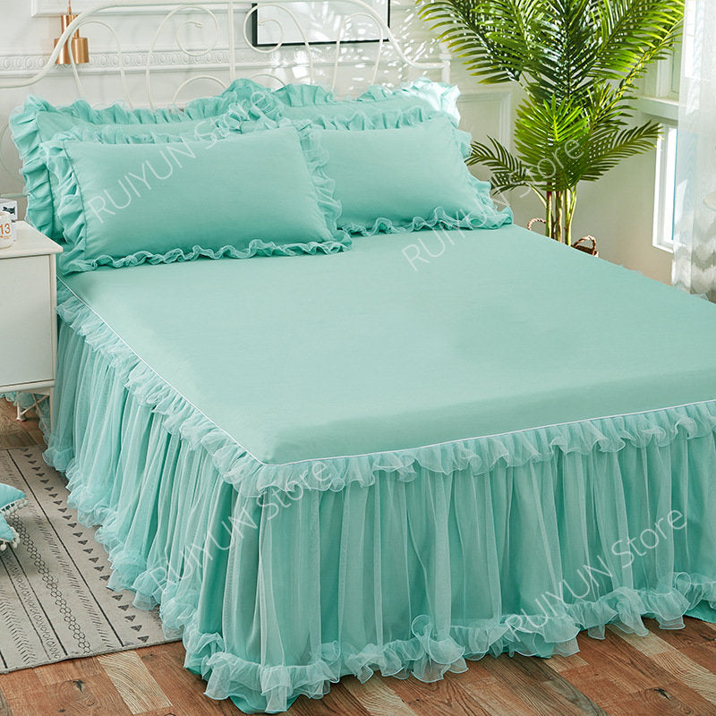 Light aqua princess lace bed skirt set with a matching duvet and pillows