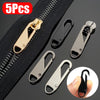 A set of five metal zipper slider pullers and a black zipper tape are shown for repair or replacement.