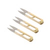 A pair of gold-toned U-shape sewing scissors used for cutting thread, yarn, fabric, and needlework.