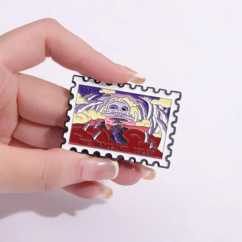 A hand holds a vintage enamel airline ticket lapel pin featuring a stylized monster design.