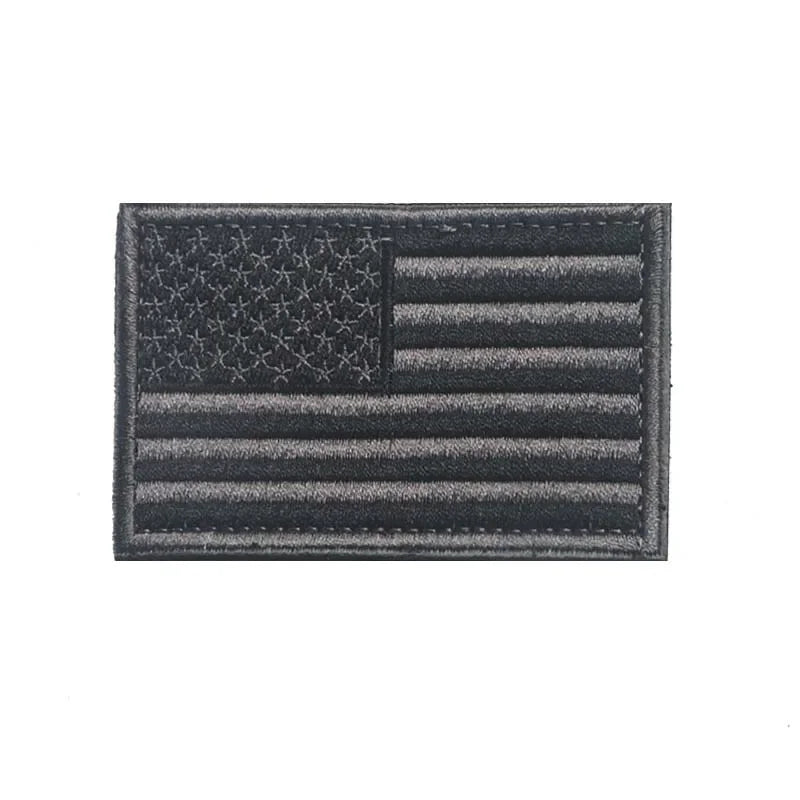 A rectangular patch depicting the American flag design with hook and loop backing.