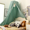 A princess hanging bed canopy with light green fabric and stuffed animals in a bedroom setting.