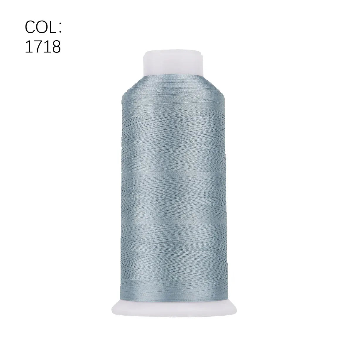A roll of light blue polyester embroidery thread with a white core.