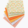 A stack of colorful floral dot pattern cotton fabric squares in various patterns and colors.