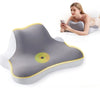 A gray ergonomic wedge pillow for neck support is shown next to a woman using a smartphone.