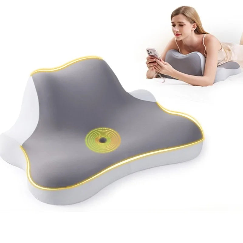A gray ergonomic wedge pillow for neck support is shown next to a woman using a smartphone.
