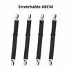 Four black stretchable bed sheet corner straps, 68cm long.