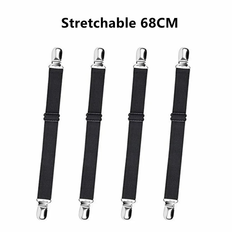 Four black stretchable bed sheet corner straps, 68cm long.