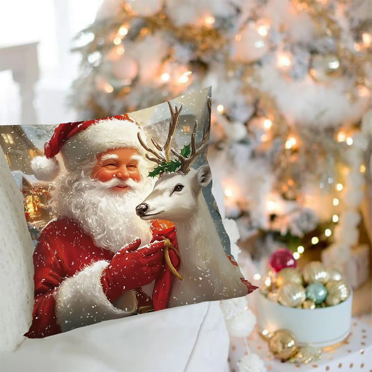 A festive Christmas throw pillow featuring Santa and a reindeer on a snowy background.