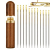 A set of stainless steel self-threading sewing needles housed in a wooden container.