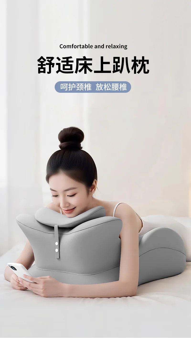 A woman is relaxing on a bed using a gray ergonomic memory foam wedge pillow for comfort and relaxation.