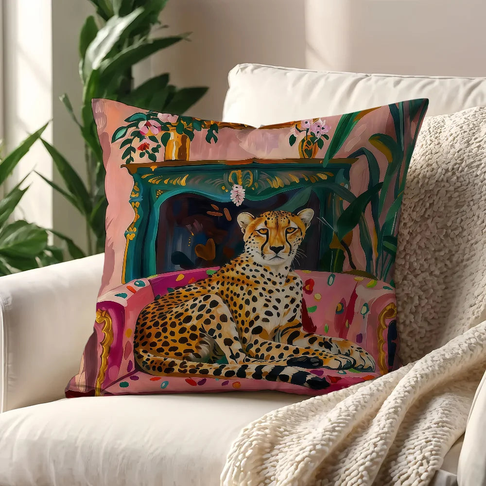 A decorative cushion cover featuring a leopard print cheetah design surrounded by lush green foliage and floral accents.