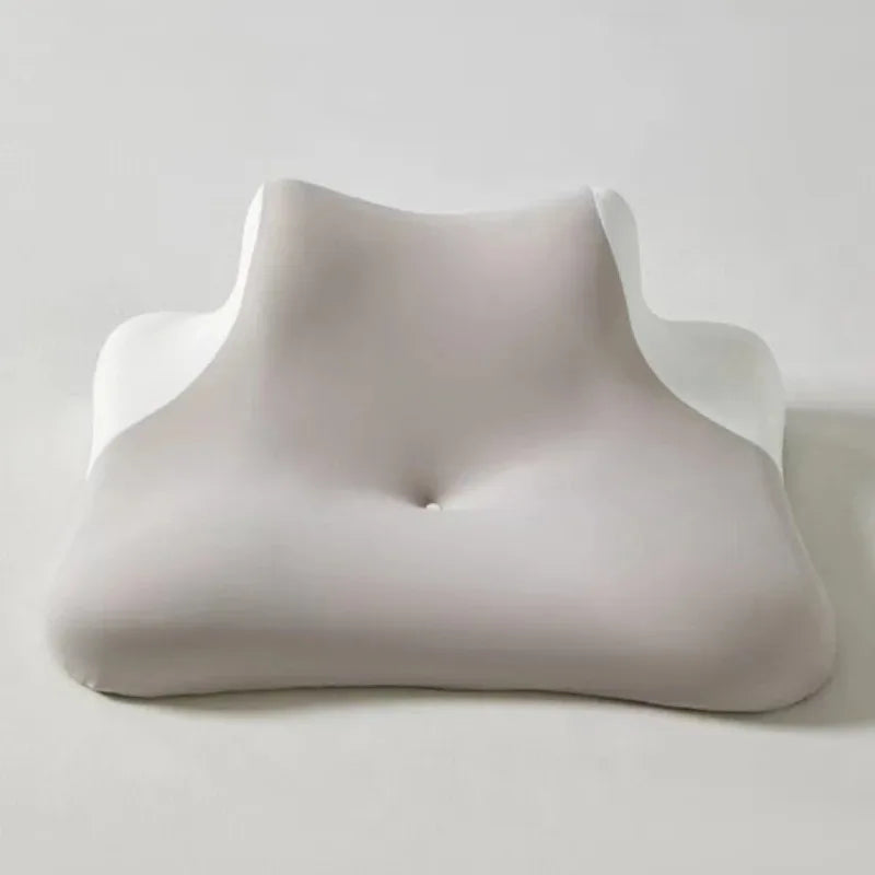 A light gray ergonomic wedge pillow designed for neck support and versatile comfort.