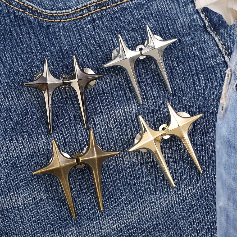 A set of silver and gold Y2K star clips for fastening jeans and skirts
