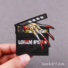 Black embroidered patch featuring a stylized, bloody hand design with white and yellow fingers on a dark fabric background