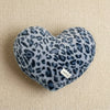 A heart-shaped plush pillow with a gray and black leopard print pattern.