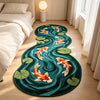 A round rug featuring an artistic design of orange and white koi fish swimming among green lotus leaves on a light wood floor