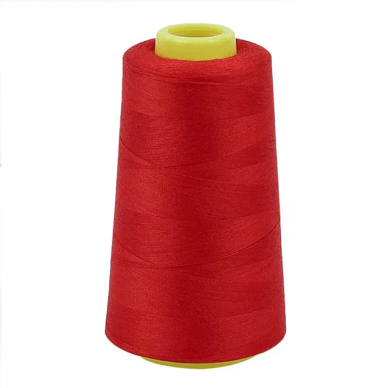 A red spool of premium sewing thread with a yellow core.