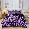 A purple and black leopard print duvet cover set displayed on a bed in a bright room.