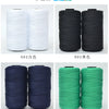 A set of hand knitting and crochet cord in white, black, navy blue, and green colors shown in spools.