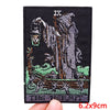 A black embroidery patch featuring the Roman numeral IX above a depiction of a hermit figure and a deer.
