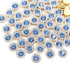 A close-up of sunflower crystal rhinestone sew-on buttons in blue and clear tones.