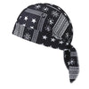 Black paisley print unisex headwrap featuring white stars and geometric patterns