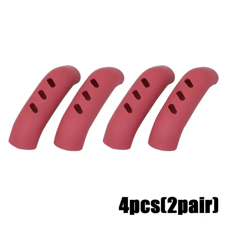Four pink silicone pan handle covers designed to protect heat resistant pot handles.