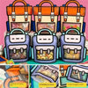 A set of cute cartoon birthday and party goodie bags in various colors and designs.