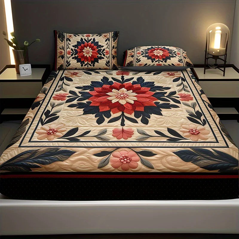 A floral print fitted sheet set with pillowcases featuring red, pink, and blue patterns on a bed.