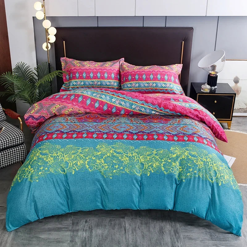 A vibrant boho geometric duvet cover set featuring teal, pink, and yellow floral patterns on a bed.