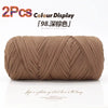 Two packs of brown elastic yarn for crafting displayed on a white background.