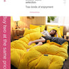 A bright yellow double-sided selection of ultra-soft corduroy duvet covers shown on a bed.